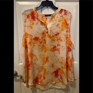 CURE women’s sleeveless blouse